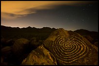 Petroglyphs on Signal Hill and Tucson Mountains at night. Saguaro National Park, Arizona, USA.