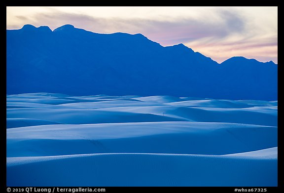 Gypsum dune field and Andres Mountains at sunset. White Sands National Park, New Mexico, USA.
