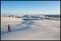 Visitor Looking, sand dunes. White Sands National Park, New Mexico, USA.