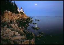Bass Harbor Lighthouse, moon and reflection. Acadia National Park, Maine, USA.