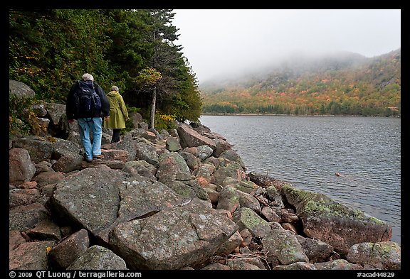 Hikers on shore of Jordan Pond. Acadia National Park, Maine, USA.