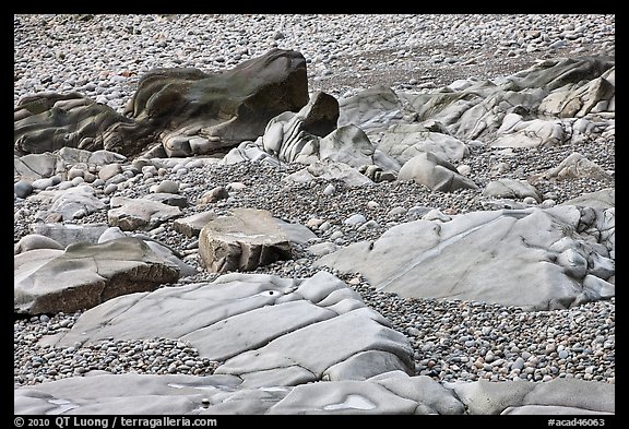 Slabs and pebbles on beach, Schoodic Peninsula. Acadia National Park, Maine, USA.