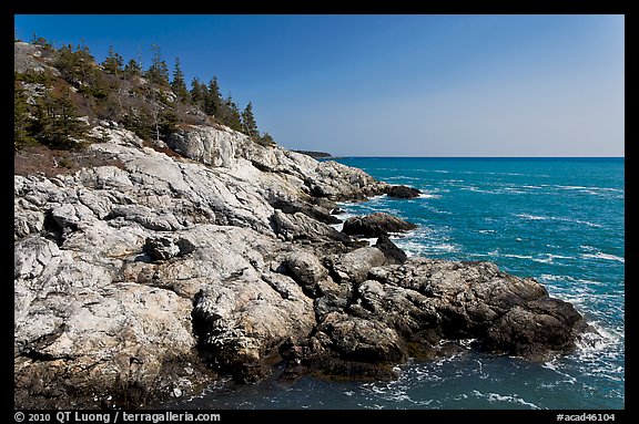 Rocky coast and blue waters, Isle Au Haut. Acadia National Park, Maine, USA.