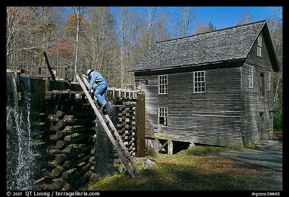 Miller climbing onto millrace, Mingus Mill, North Carolina. Great Smoky Mountains National Park, USA.