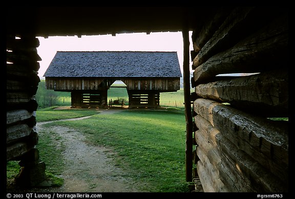 Cantilever barn framed by doorway, Cades Cove, Tennessee. Great Smoky Mountains National Park (color)