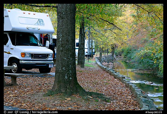 RV, trees in fall colors, and stream. Hot Springs National Park (color)
