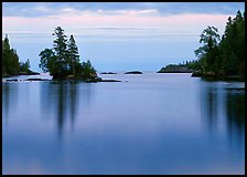 Tree-covered islet and smooth waters, Chippewa Harbor. Isle Royale National Park ( color)