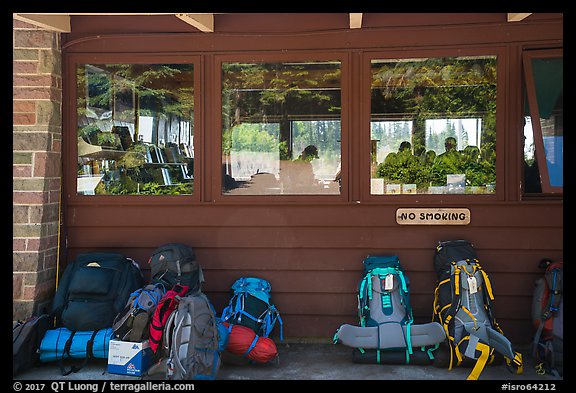 Backpacks lined behind visitor center, Rock Harbor. Isle Royale National Park (color)