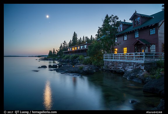 Rock Harbor Lodge and moon at dusk. Isle Royale National Park, Michigan, USA.