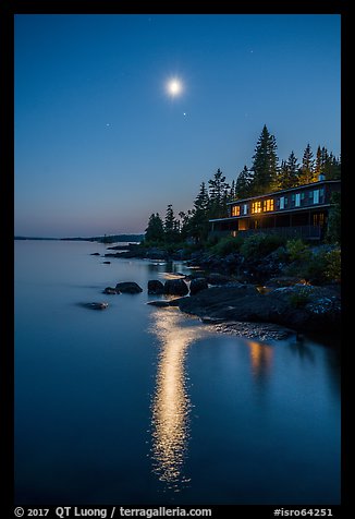 Rock Harbor Lodge at night, moon and reflection. Isle Royale National Park, Michigan, USA.