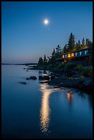 Rock Harbor Lodge at night, moon and reflection. Isle Royale National Park, Michigan, USA.