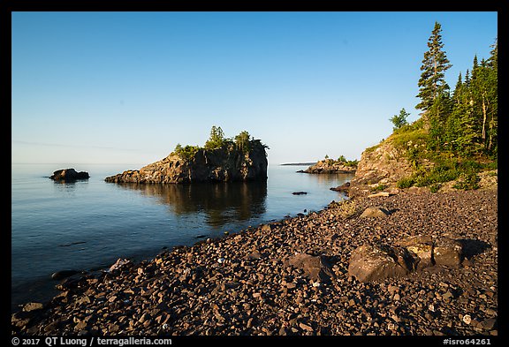 Rocky beach, offshore islet, and Lake Superior, Mott Island. Isle Royale National Park, Michigan, USA.