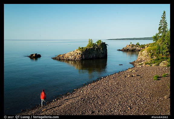 Visitor looking, Mott Island. Isle Royale National Park, Michigan, USA.