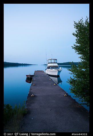 Motorboat and yacht moored at Moskey Basin dock. Isle Royale National Park (color)