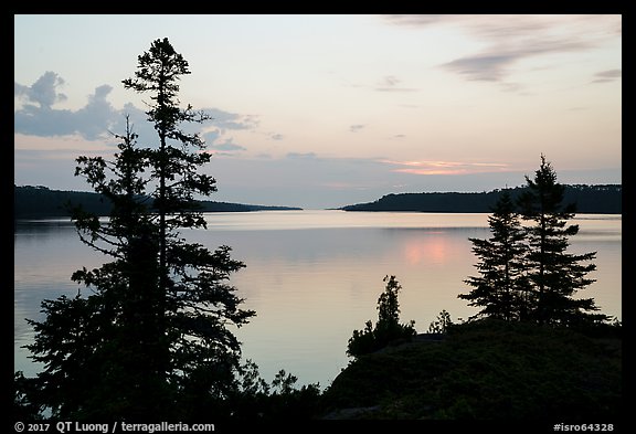 Trees and calm waters, Moskey Basin, dawn. Isle Royale National Park, Michigan, USA.