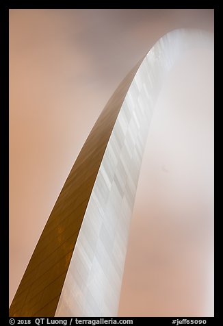 Curve of Gateway Arch on foggy night. Gateway Arch National Park, St Louis, Missouri, USA.