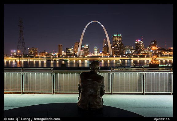 St Louis skyline and Malcom Martin statue from Mississippi River Overlook at night. Gateway Arch National Park (color)