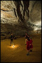 Ranger talking to family in cave. Mammoth Cave National Park ( color)