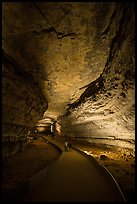 Visitors walk down path in cave. Mammoth Cave National Park ( color)