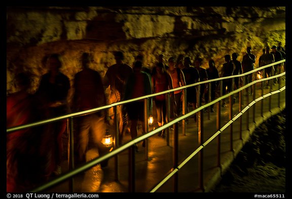 Motion blurred visitors holding lanterns. Mammoth Cave National Park (color)