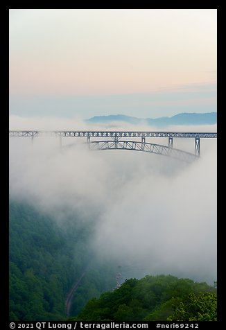 New River Gorge Bridge emerging from fog at dawn. New River Gorge National Park and Preserve (color)