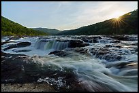 Sandstone Falls with sun star. New River Gorge National Park and Preserve ( color)