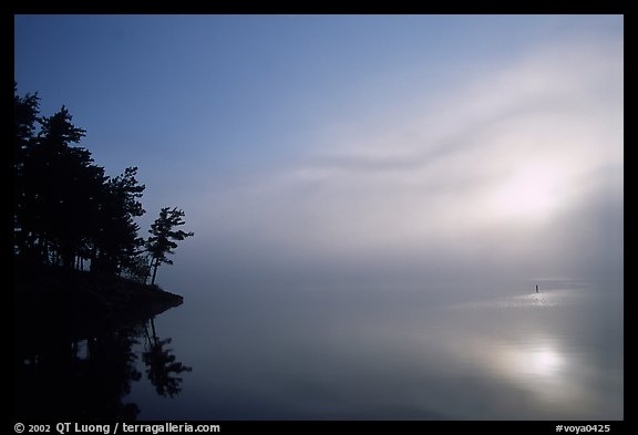 Sunrise and morning fog, Kabetogama lake near Woodenfrog. Voyageurs National Park, Minnesota, USA.