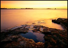 Lake and eroded granite at sunrise, Kabetogama Lake. Voyageurs National Park, Minnesota, USA.