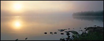 Misty lake scene with sun piercing fog, Kabetogama Lake. Voyageurs National Park (Panoramic color)