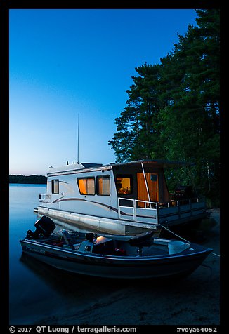 Motorboat and houseboat at dusk, Houseboat Island, Sand Point Lake. Voyageurs National Park (color)