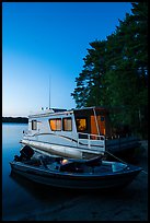 Motorboat and houseboat at dusk, Houseboat Island, Sand Point Lake. Voyageurs National Park ( color)