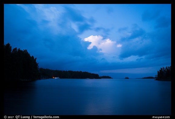 Anderson Bay at dusk, with lights of houseboat. Voyageurs National Park (color)