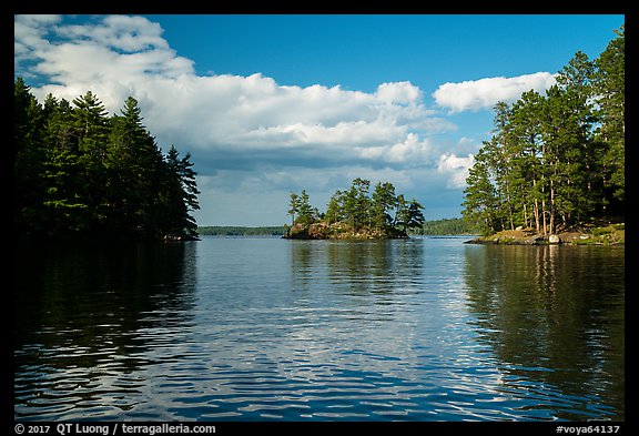 Islet and reflections, Sand Point Lake. Voyageurs National Park, Minnesota, USA.