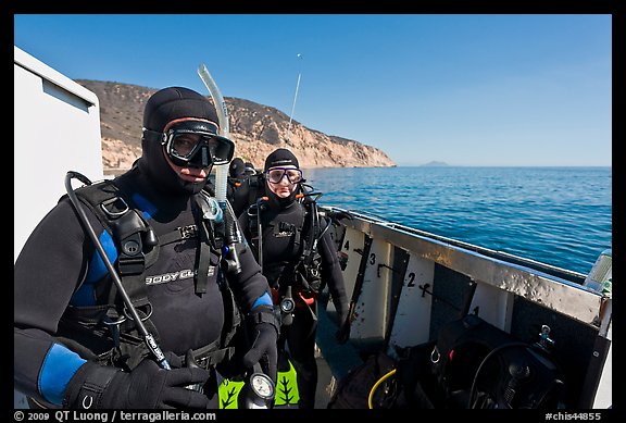 Scuba divers in wetsuits ready to dive from boat, Santa Cruz Island. Channel Islands National Park (color)