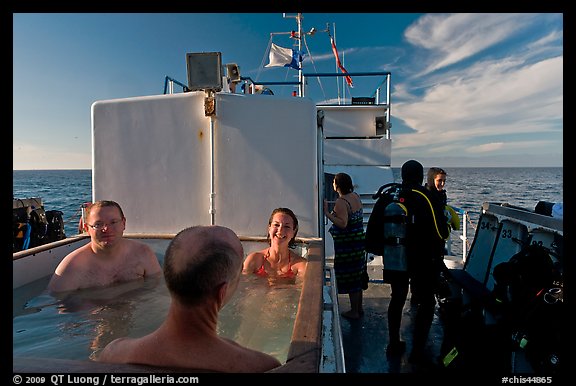 Soaking in hot tub on diving boat, Annacapa Island. Channel Islands National Park (color)