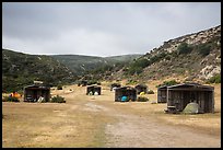 Tents pitched in wind shelters, Santa Rosa Island. Channel Islands National Park ( color)