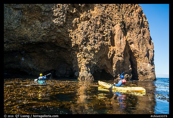 Kayaking towards sea cave, Santa Cruz Island. Channel Islands National Park (color)