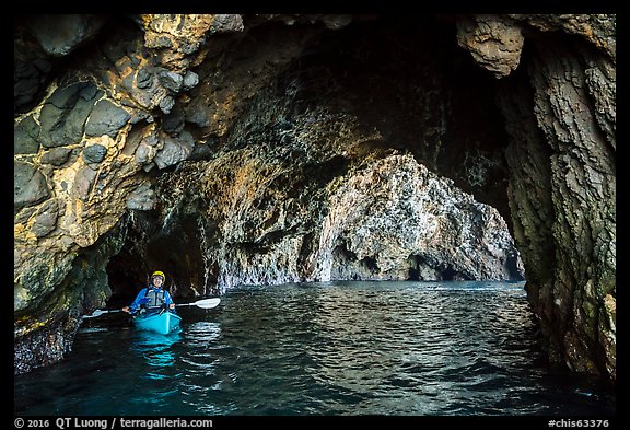 Kayaker in sea cave, Santa Cruz Island. Channel Islands National Park (color)