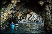 Kayaker in sea cave, Santa Cruz Island. Channel Islands National Park ( color)