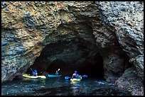 Kayakers at the entrance of sea cave, Santa Cruz Island. Channel Islands National Park ( color)