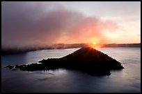 Sun rising behind Wizard Island. Crater Lake National Park ( color)