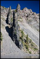 Devils Backbone, vertical dike of dark andesite lining the cliff face. Crater Lake National Park ( color)