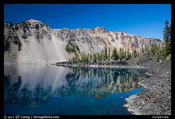 Watchman reflected in Fumarole Bay, Wizard Island. Crater Lake National Park, Oregon, USA.