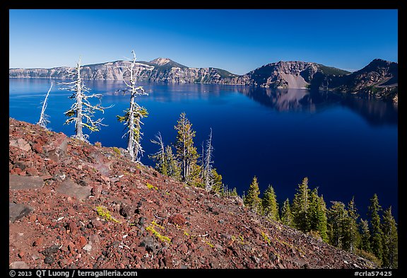 Red cinders and ash on Wizard Island. Crater Lake National Park, Oregon, USA.