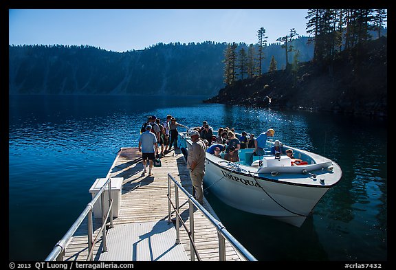 Visitors embark on tour boat at Wizard Island boat dock. Crater Lake National Park, Oregon, USA.