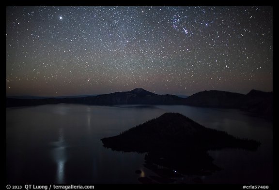 Stars and reflections over lake. Crater Lake National Park, Oregon, USA.