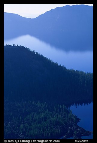 Wizard Island and crater rim profiles, early morning. Crater Lake National Park (color)