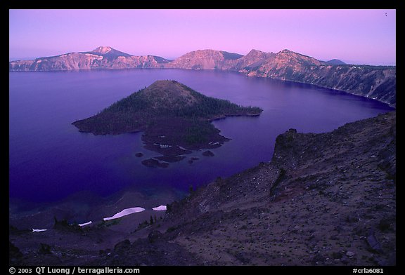 Wizard Island and crater at sunset. Crater Lake National Park