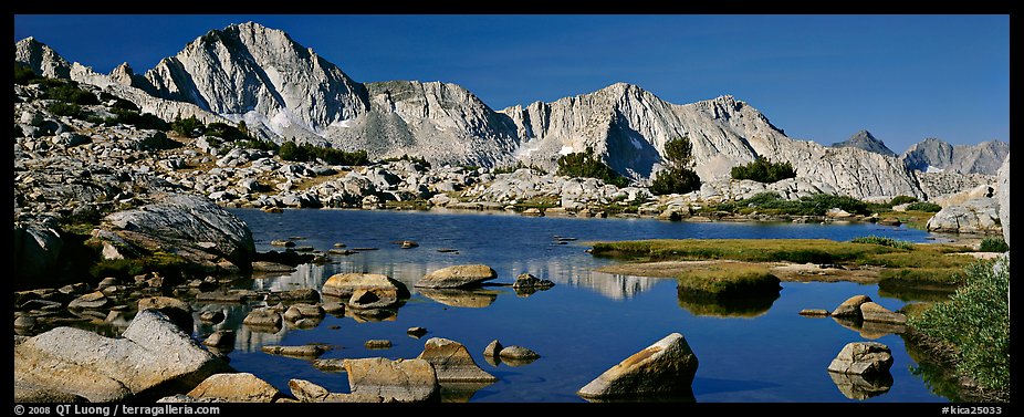 High Sierra peaks reflected in blue alpine lake. Kings Canyon National Park (color)