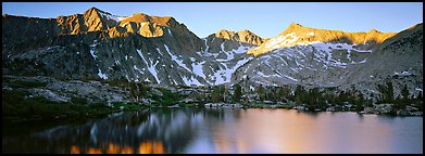 Last light over peaks and reflections. Kings Canyon National Park (Panoramic color)
